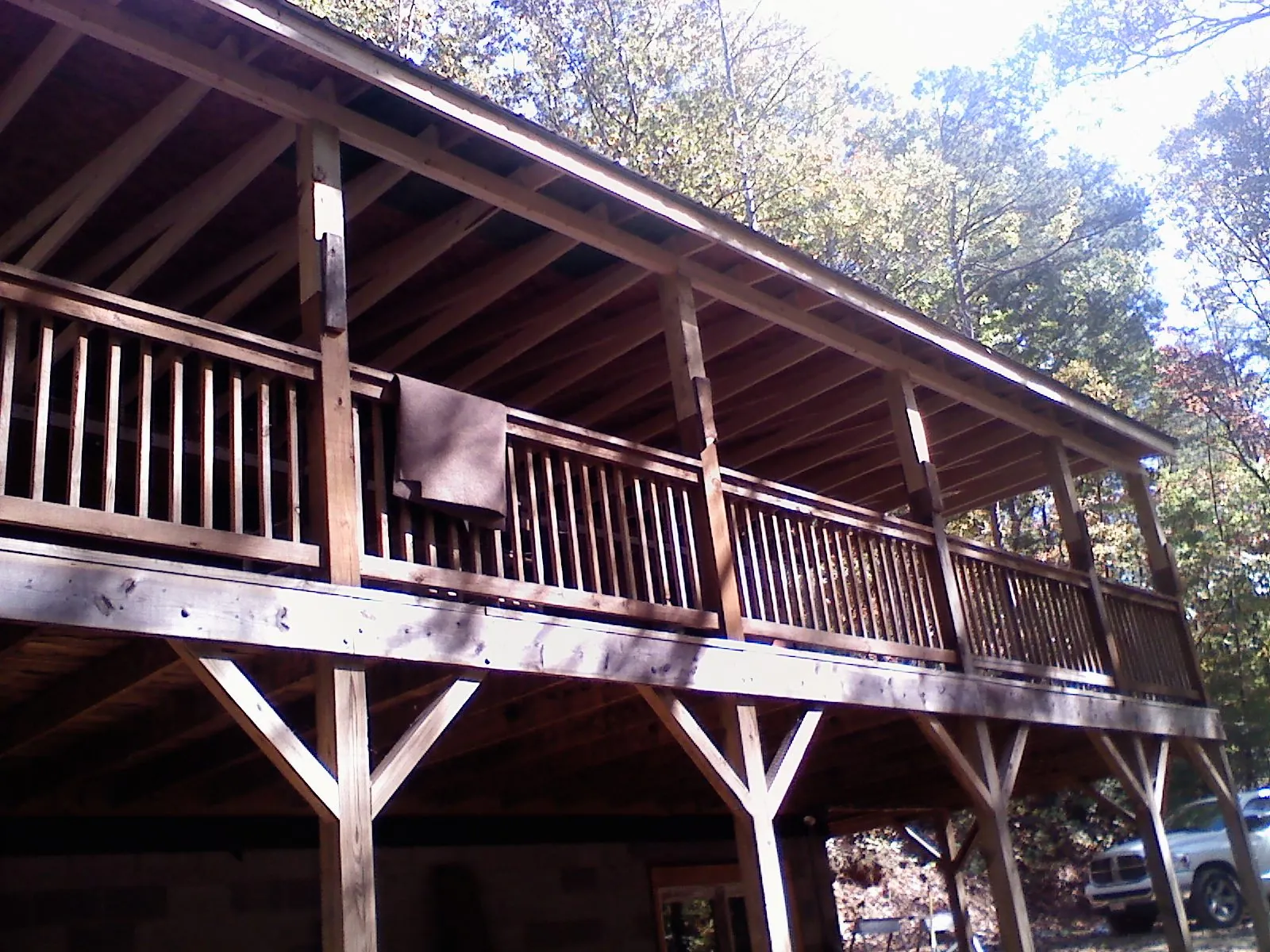Timber framing under a new elevated porch and deck — Roof Leak Repair in Romayor by Roofing Brothers